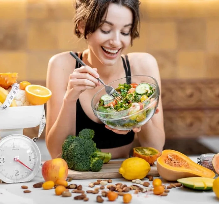 Woman enjoying a healthy salad